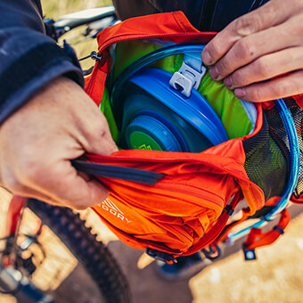 Dedicated, zippered hydration pocket with SpeedClip attachment system