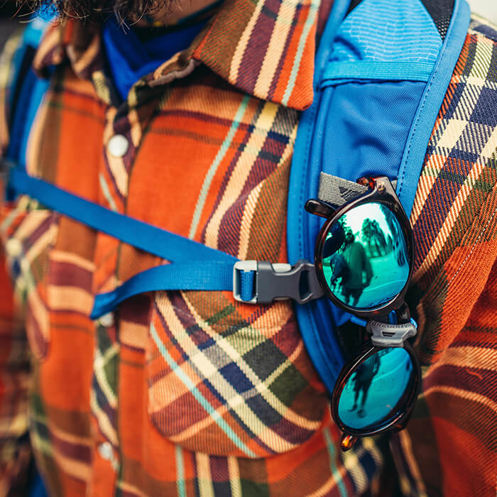 Sunglass QuickStow system on shoulder harness for quick, secure and scratch-free access to your shades without taking the pack off