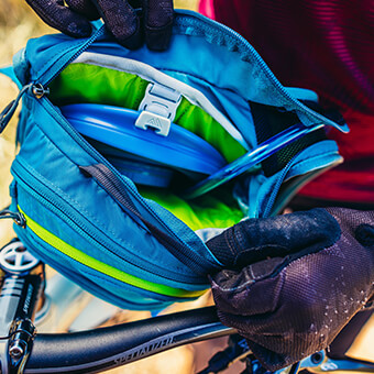 Dedicated, zippered hydration pocket with SpeedClip attachment system
