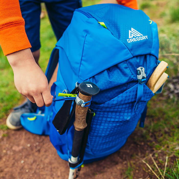 Attachment loop and quick-attach shock lock for trekking poles