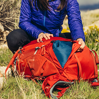 Zippered bottom sleeping bag compartment