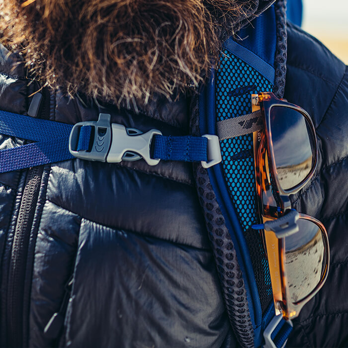 Sunglass QuickStow system - Sunglass QuickStow system on shoulder harness for quick, secure and scratch-free access to our shades without taking the pack off
